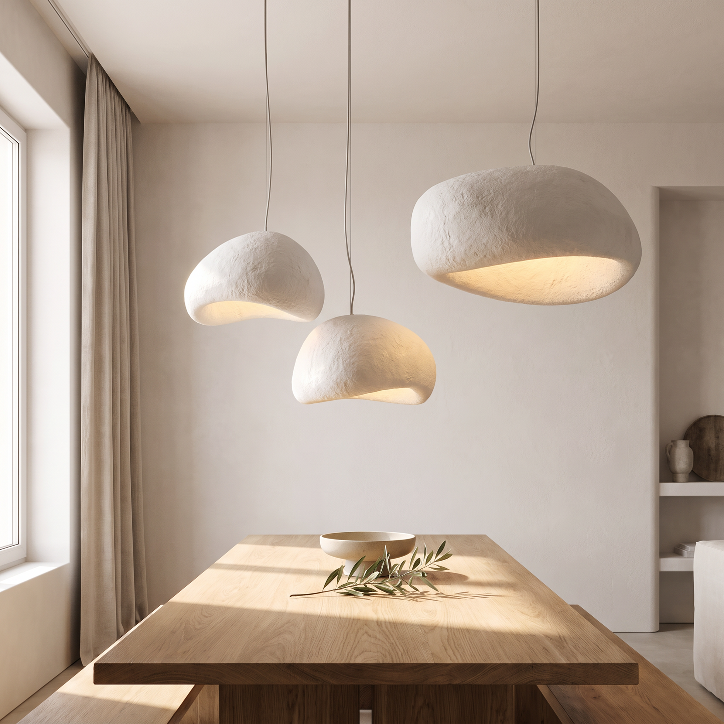 Chandelier above a dining table in a contemporary dining room