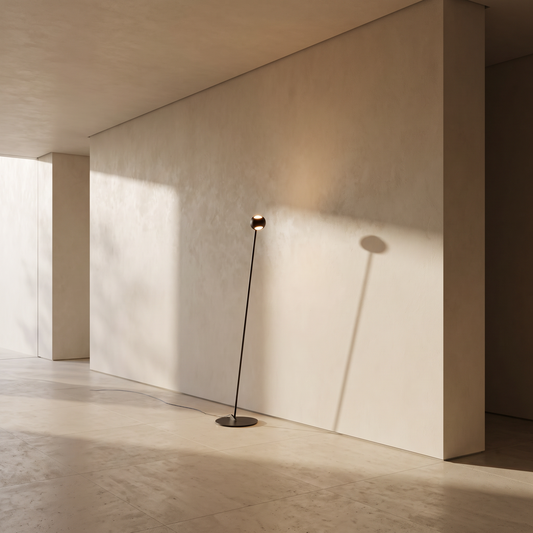 Arched floor lamp against a minimal plaster wall
