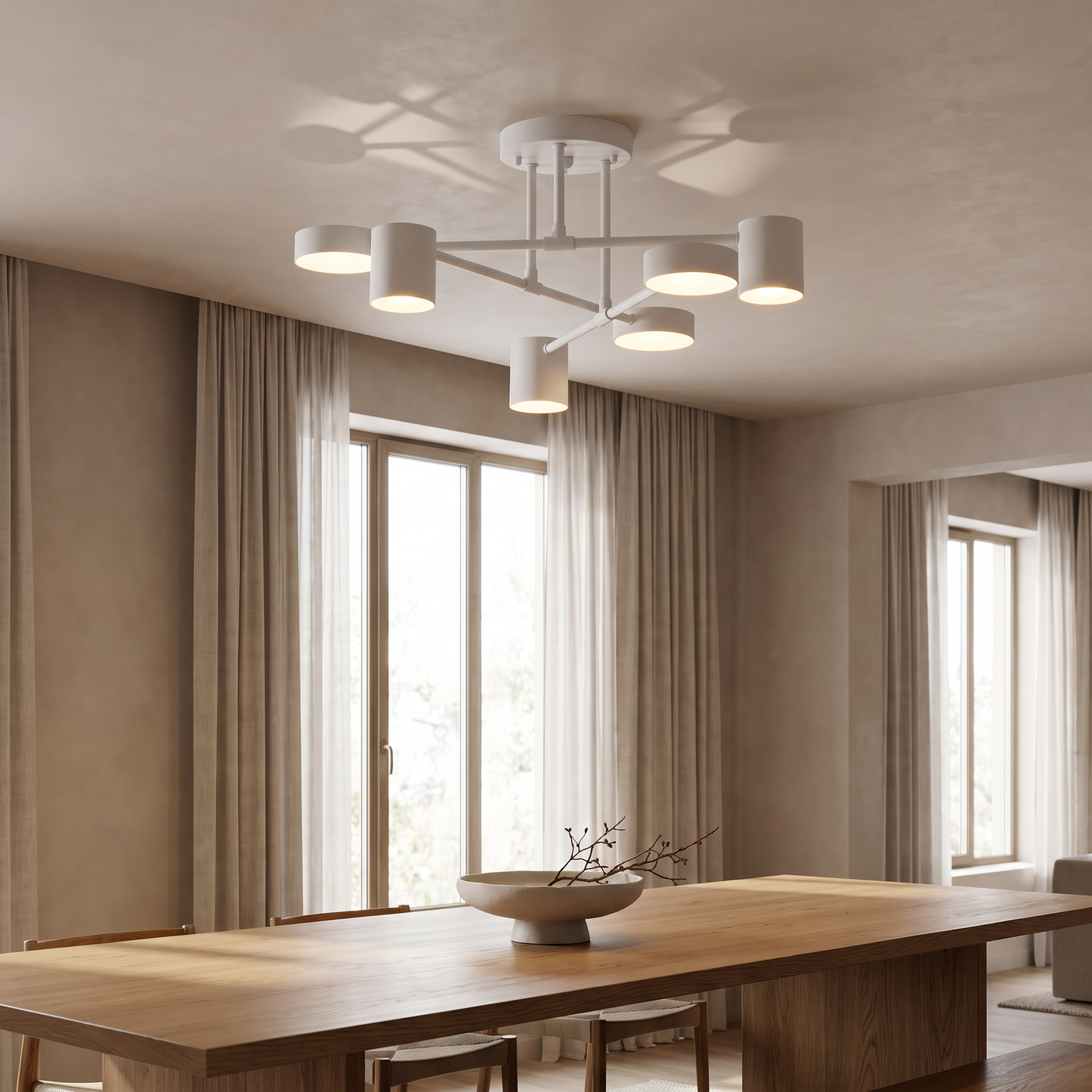 Geometric pendant above a dining table