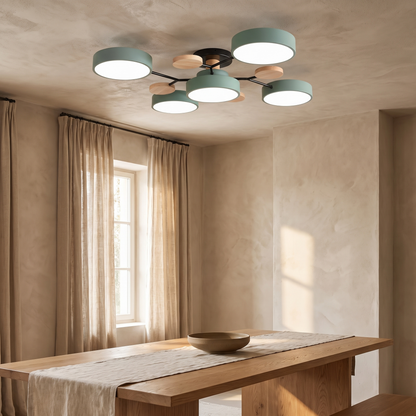 Semi flush chandelier above a dining table