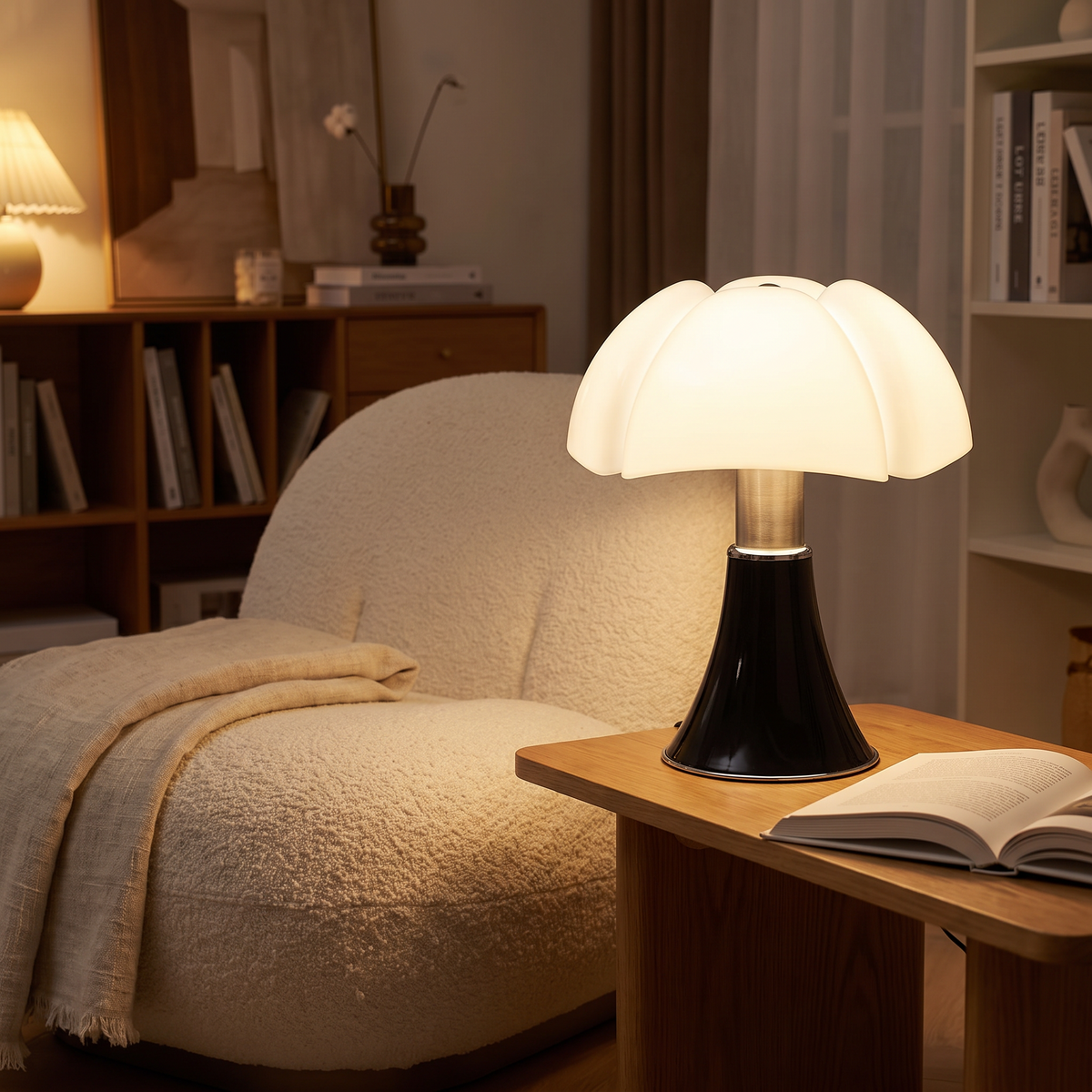 Flower table lamp lit beside a lounge chair
