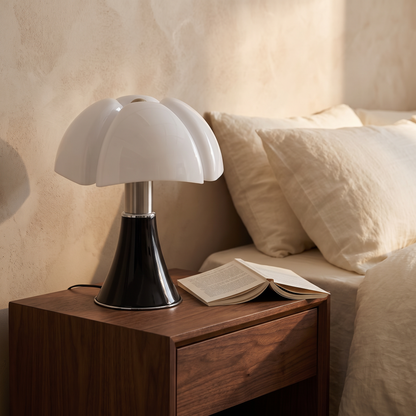 Flower table lamp on a bedroom nightstand