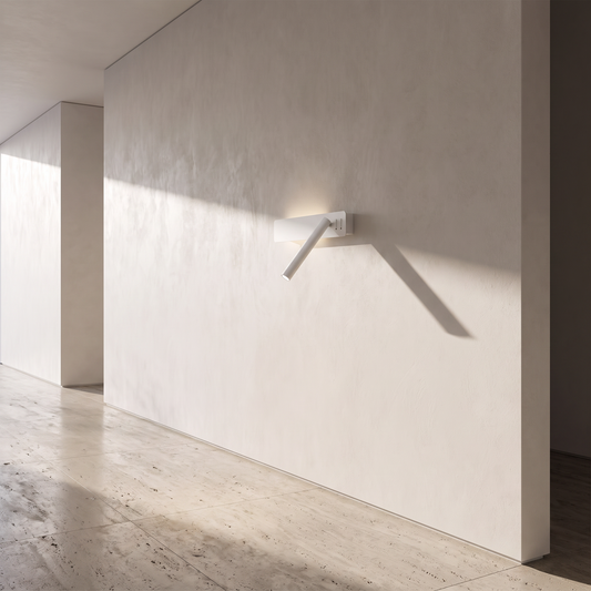 Reading arm wall light on a minimal corridor wall