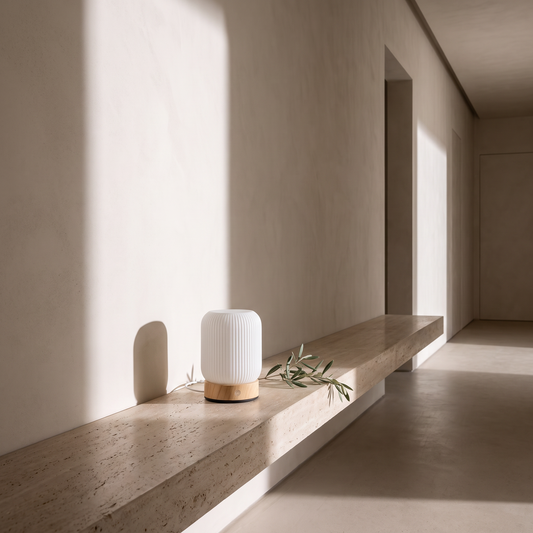 Touch lamp on a travertine ledge in a hallway