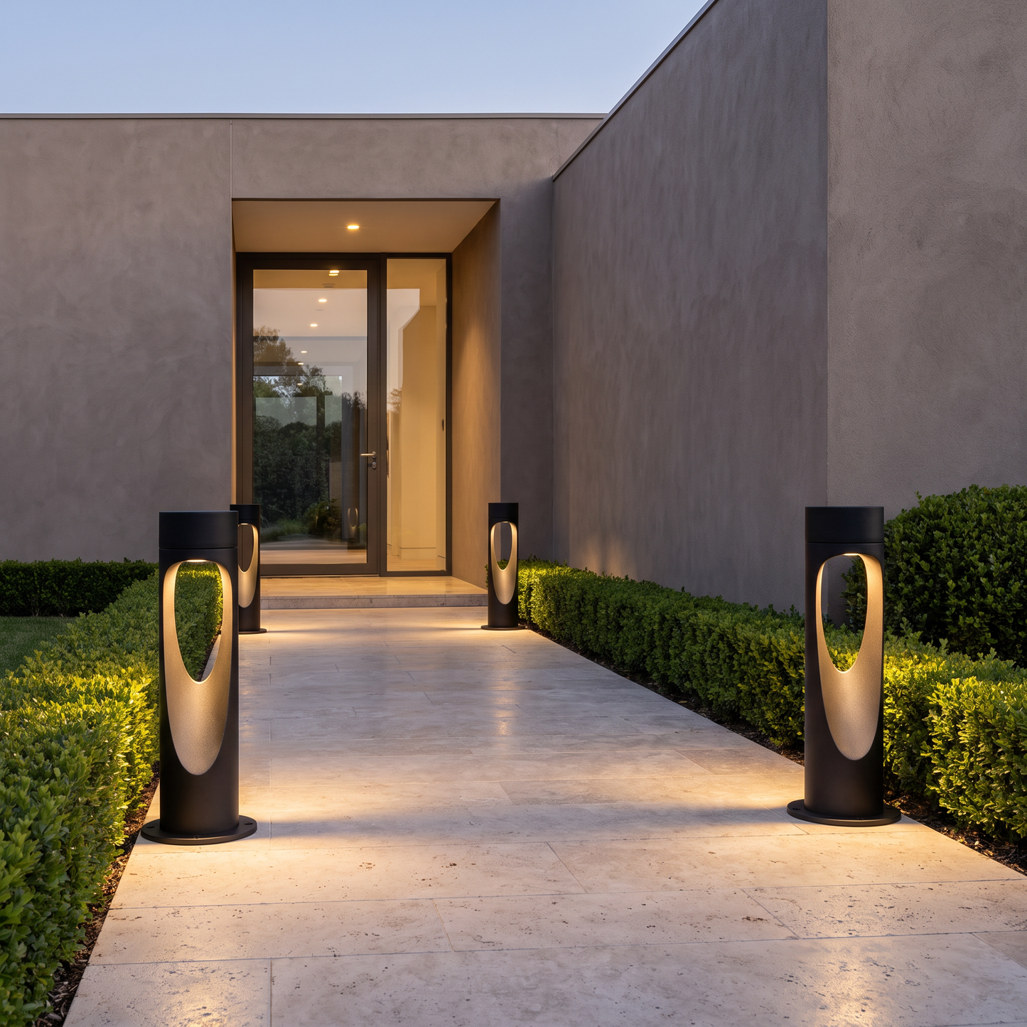 Outdoor floor lamps flanking an entrance path