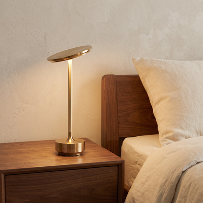 Rechargeable LED lamp on a bedside table